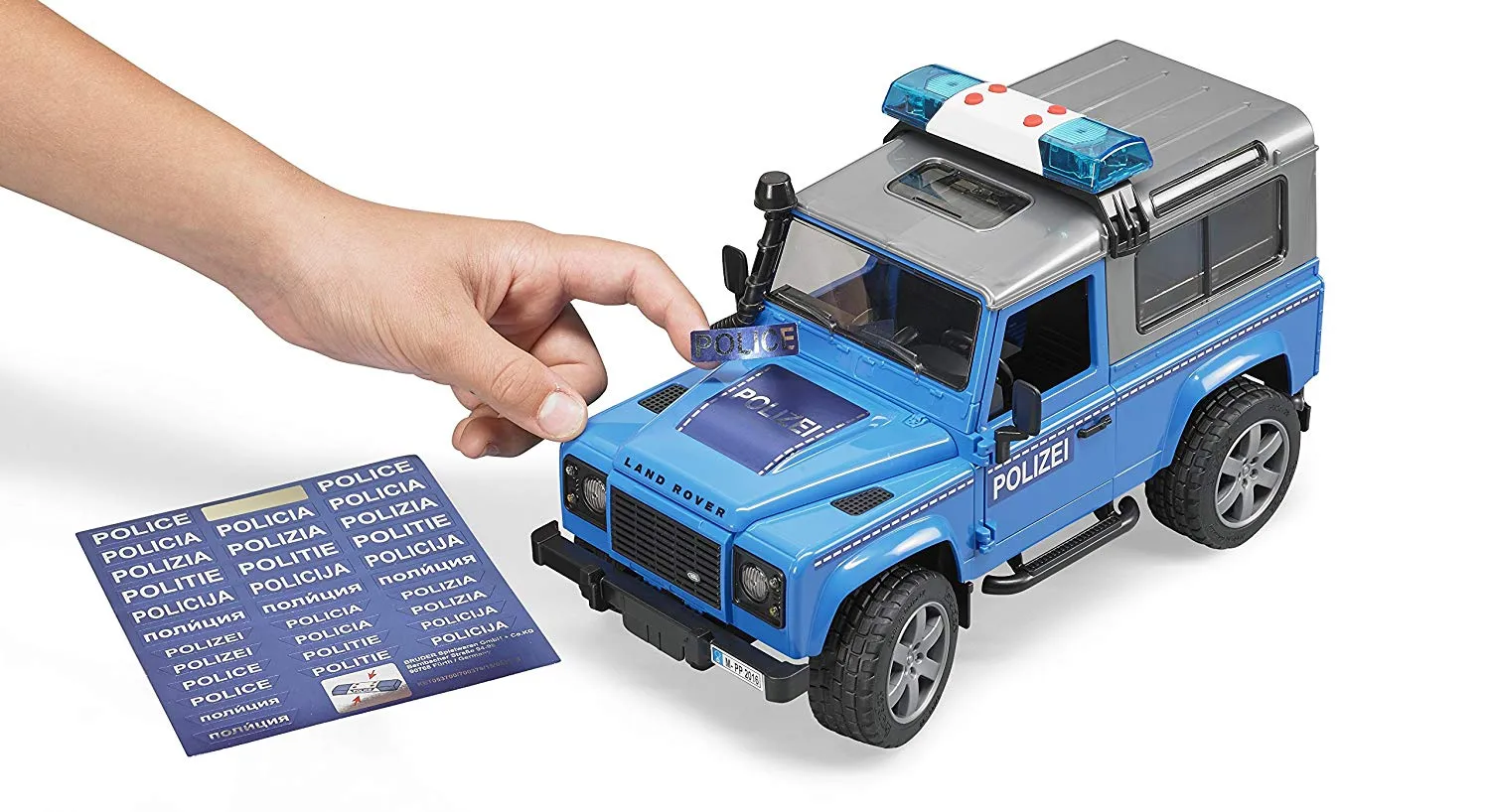 Bruder Land Rover Def St. Wagon Police Vechicle & Figure