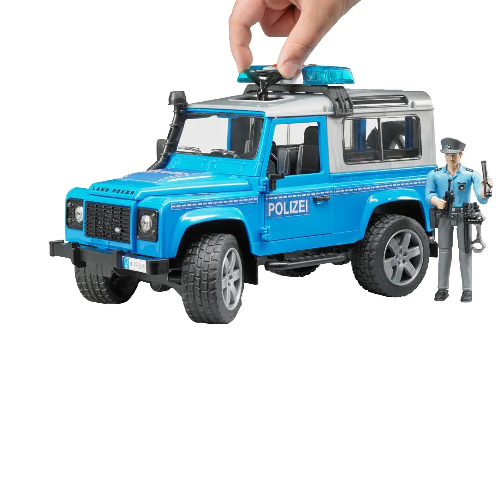 Bruder Land Rover Def St. Wagon Police Vechicle & Figure